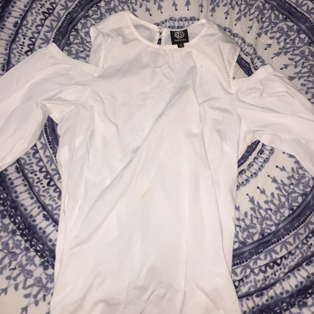 White “cold shoulder” blouse (not striped)